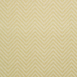 Fabric swatch of a light yellow and neutral herringbone weave fabric for curtains and upholstery