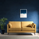 Sofa upholstered in a yellow herringbone weave upholstery fabric