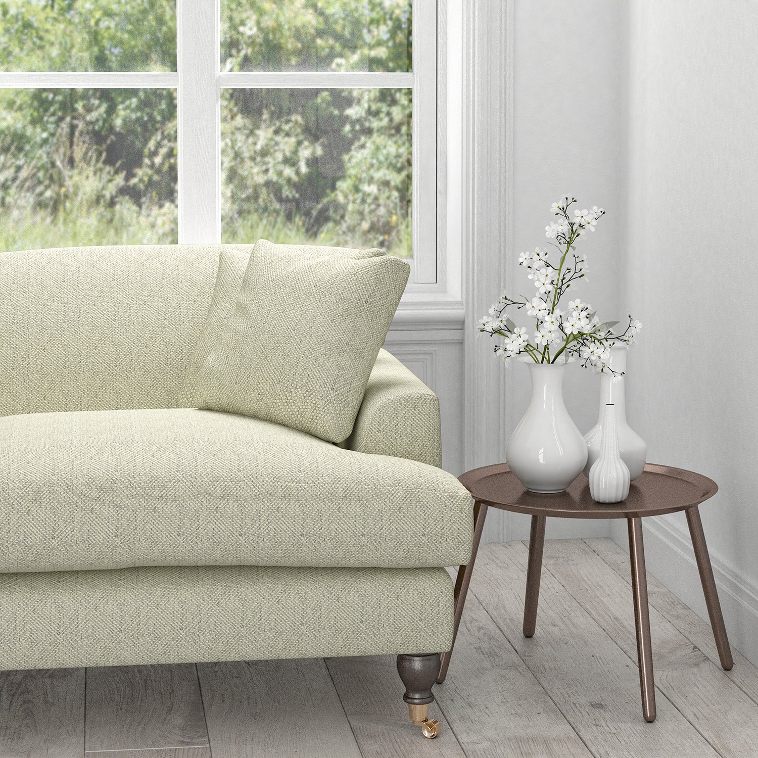 Sofa in a grey fabric with a white geometric woven design