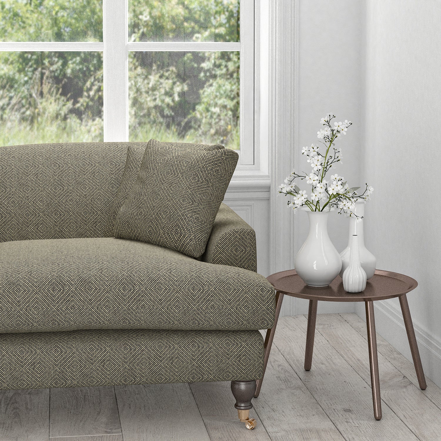 Sofa in a charcoal fabric with a light geometric woven design
