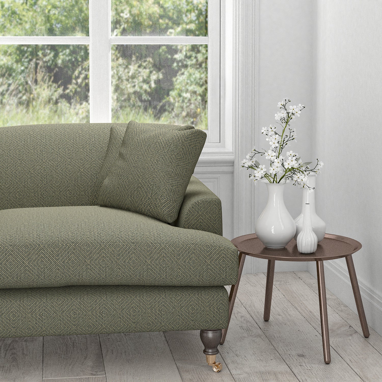 Sofa in a grey upholstery fabric with a neutral woven geometric design