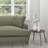 Sofa in a grey upholstery fabric with a neutral woven geometric design