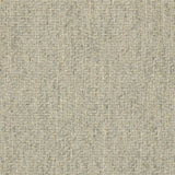 Grey fabric suitable for curtains and upholstery with a a neutral woven geometric design