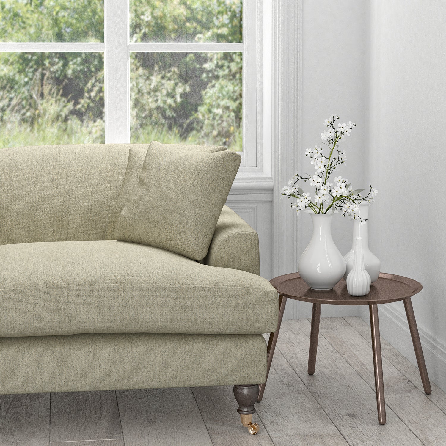 Sofa in a grey fabric with a neutral geometric woven design