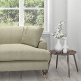 Sofa in a grey fabric with a neutral geometric woven design