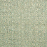 Fabric swatch of a green woven fabric for upholstery