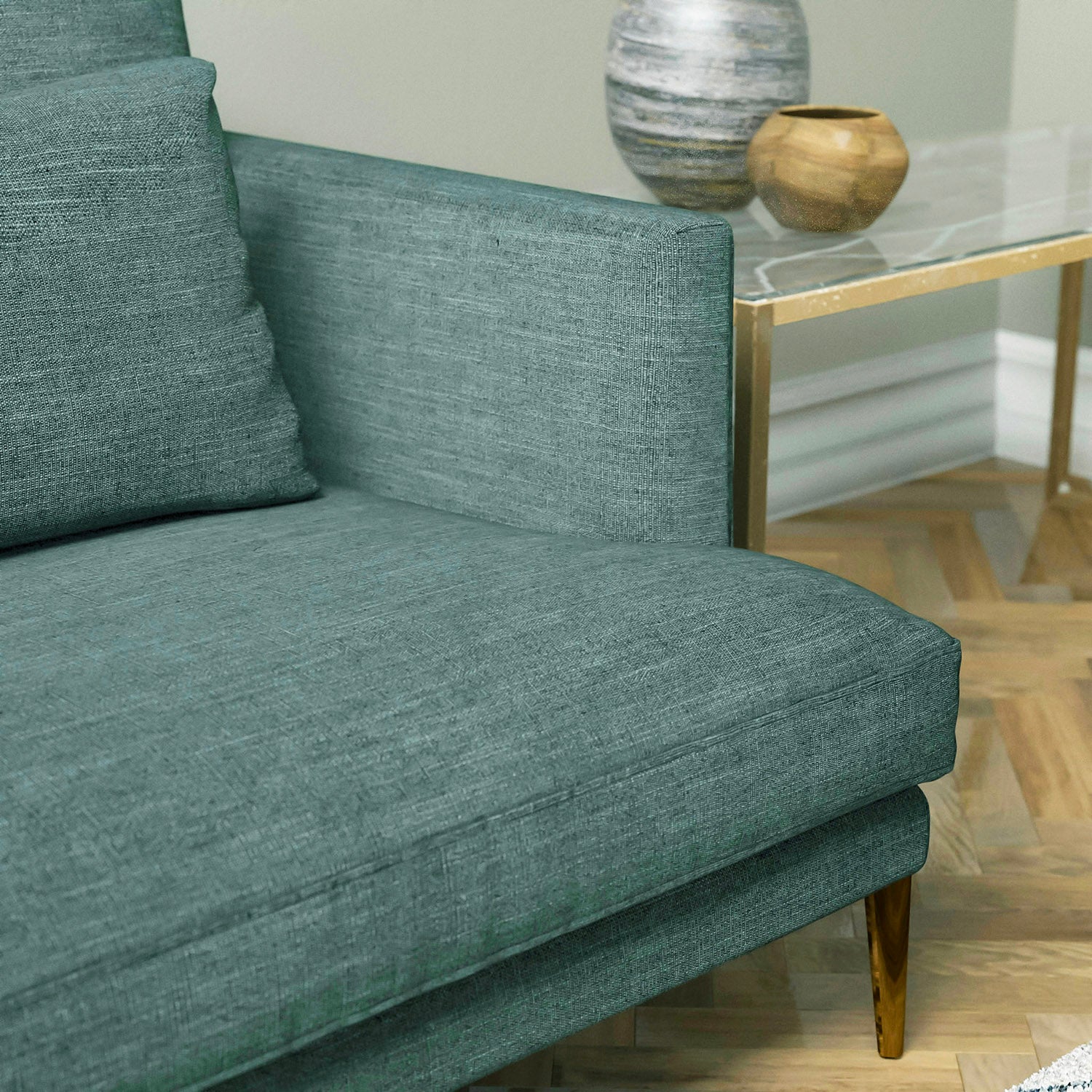 Sofa in a teal linen mix upholstery fabric