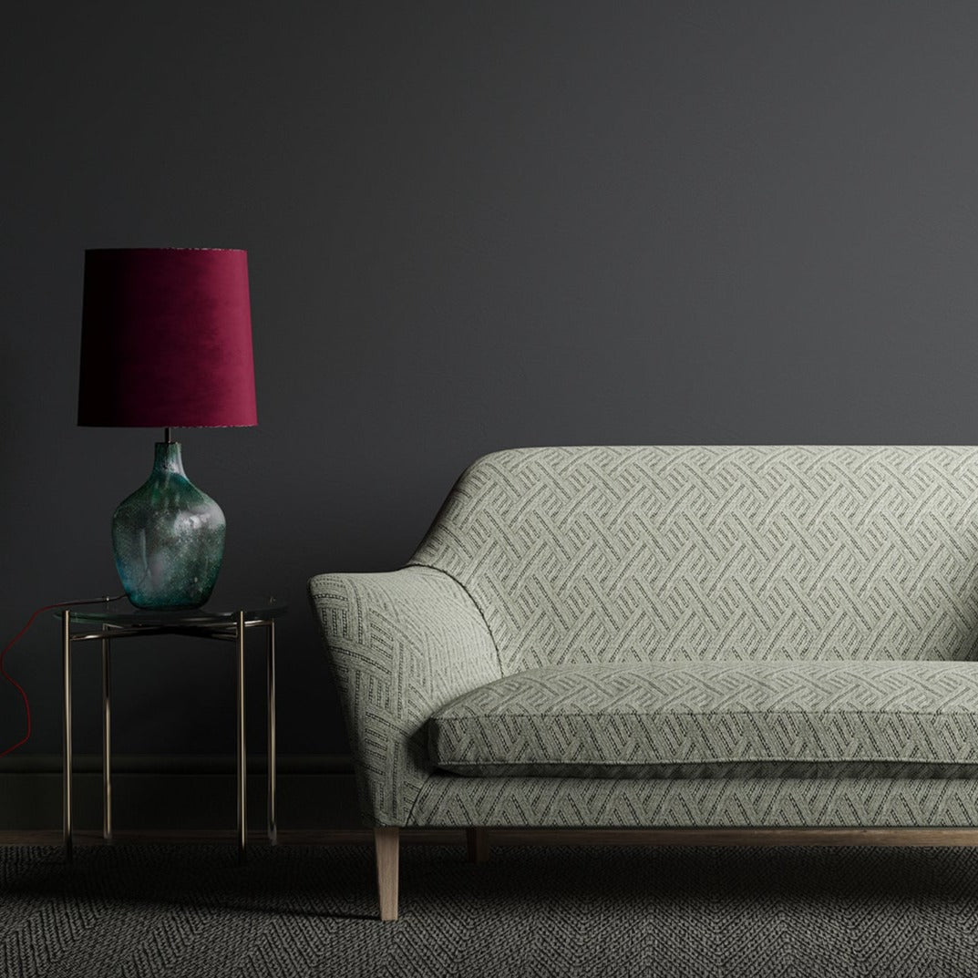 Sofa in a grey geometric upholstery fabric