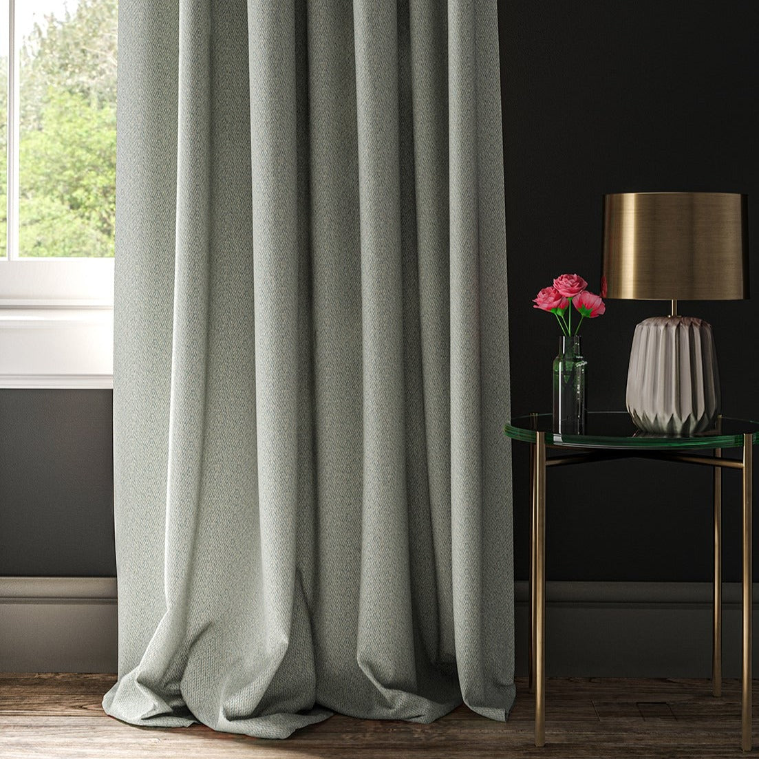Curtain in a light blue and white geometric weave fabric.