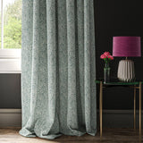Blue curtain with a small white print