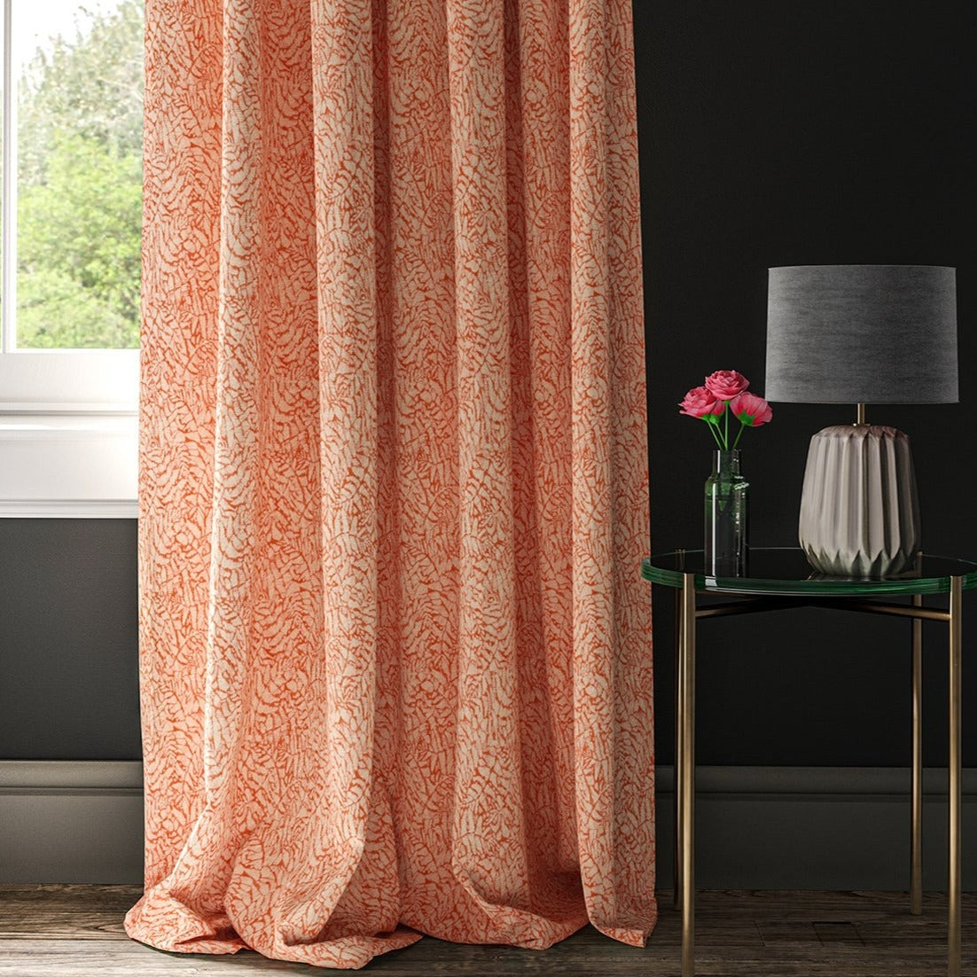 Orange woven curtain fabric with a small white print