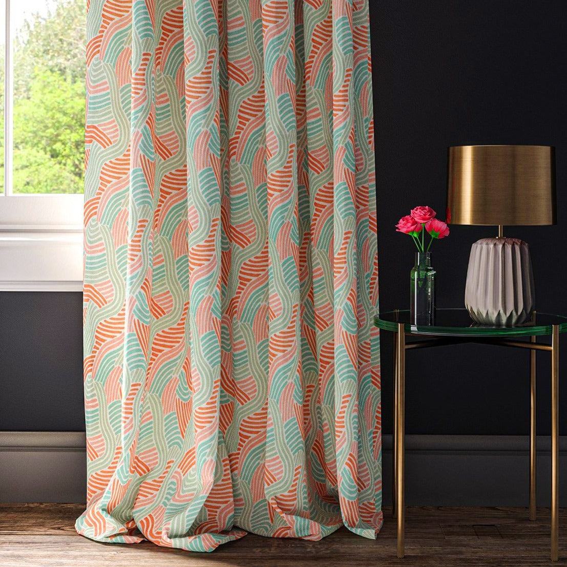 Linen curtain showcasing a wavy design in pastel pink and green 