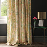 Velvet curtain showing a tropical leaf design in pink