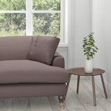 Sofa in a purple plain cotton upholstery fabric