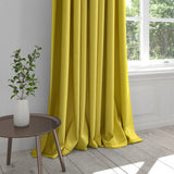 Curtain in a plain yellow cotton washable fabric