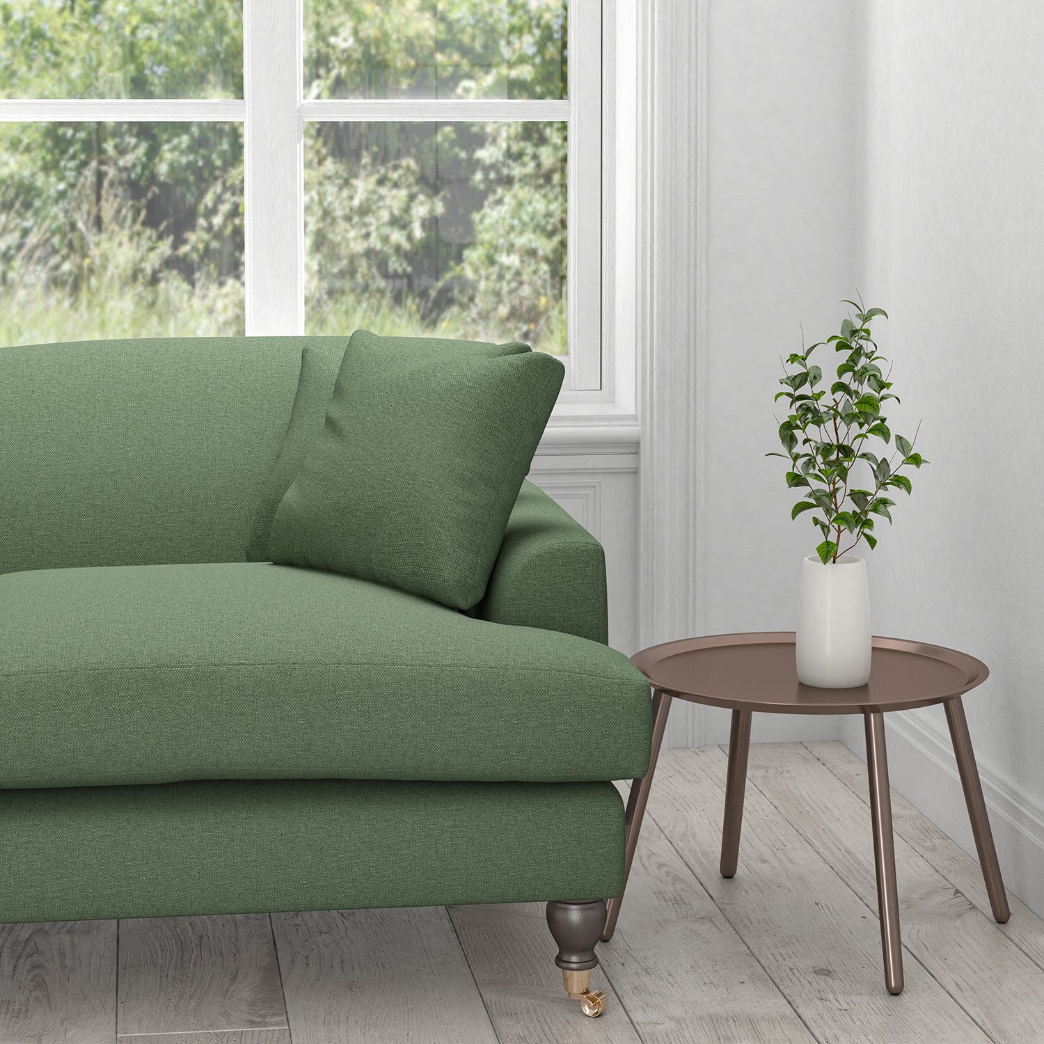 Sofa in a plain cotton sage green upholstery fabric