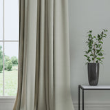 Curtain in a plain fabric, colour June.