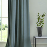 Curtain in a plain fabric, colour Bluestone.