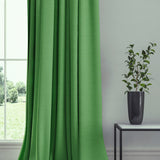 Curtain in a plain fabric, colour Mantis.