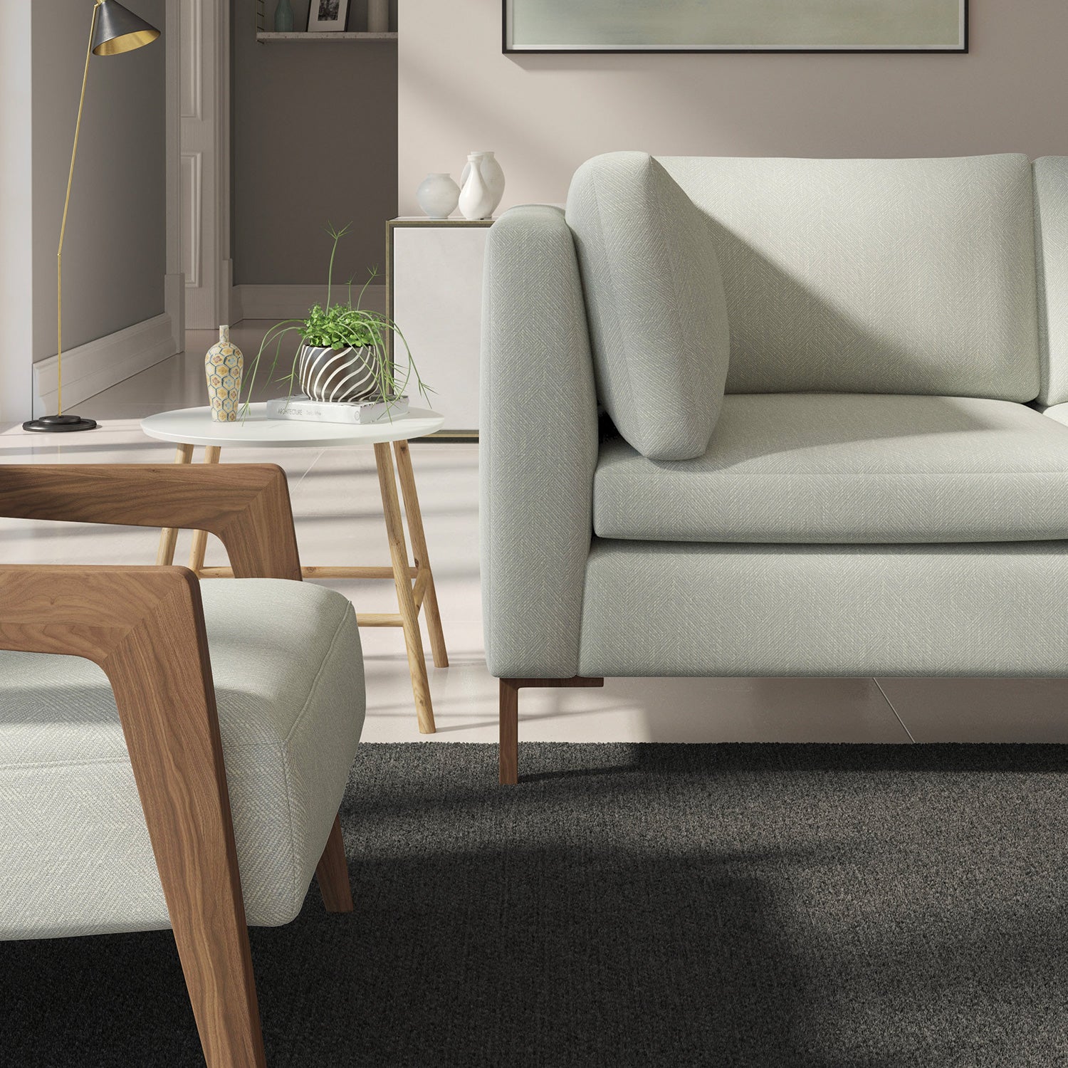 Living room with a contemporary sofa upholstered in a blue semi-plain Scandi-style upholstery fabric