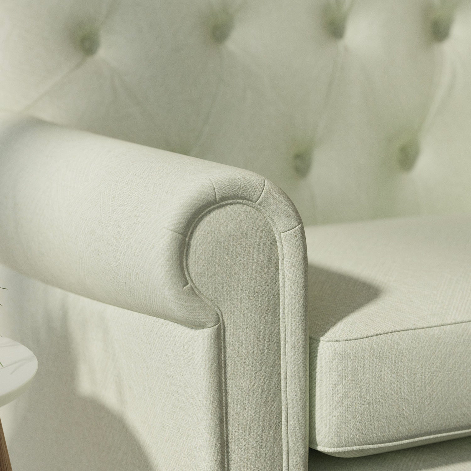 Sofa upholstered in a light blue Scandi-style semi-plain upholstery fabric with a stain resistant finish