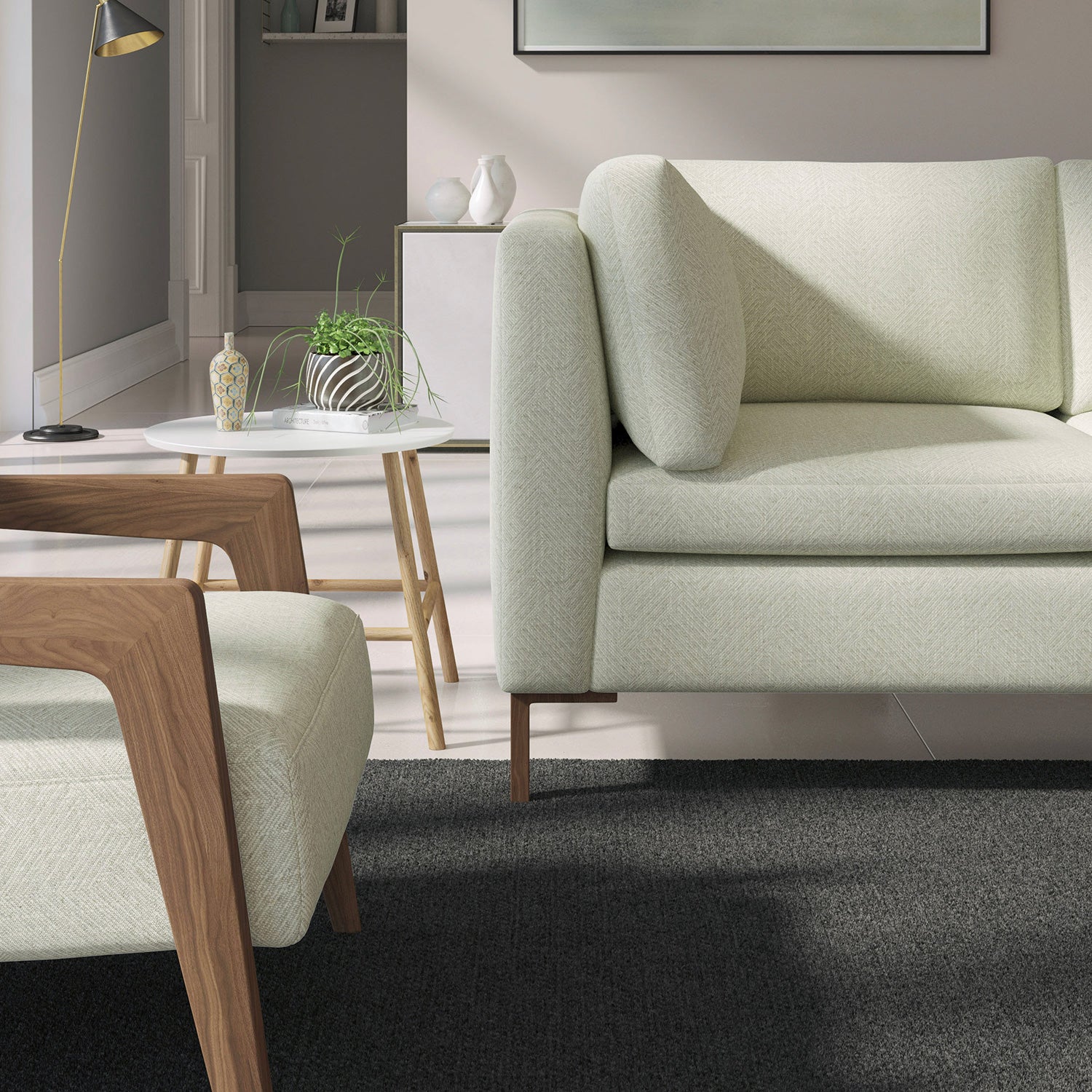 Living room with a contemporary sofa upholstered in a grey semi-plain Scandi-style upholstery fabric