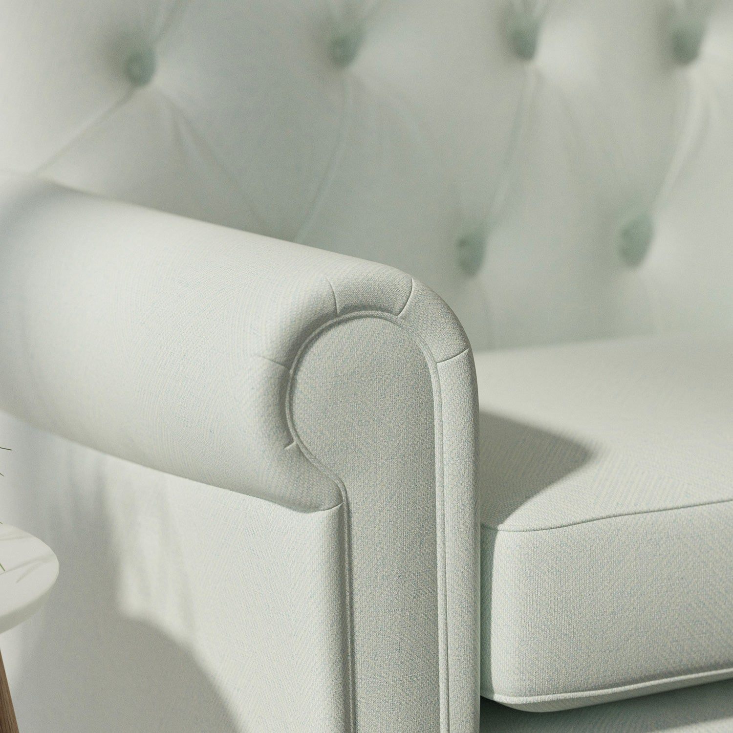 Sofa upholstered in a light blue Scandi-style semi-plain upholstery fabric with a stain resistant finish