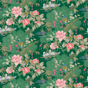 Fabric swatch of a printed velvet fabric featuring a floral design in emerald.