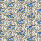 Fabric swatch of a light neutral velvet fabric for curtains and upholstery with a stain resistant finish and colourful floral bouquet