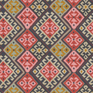 Fabric swatch of a printed velvet fabric featuring a kilim design in henna.