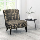 Chair upholstered in a bronze velvet upholstery fabric with abstract branch design