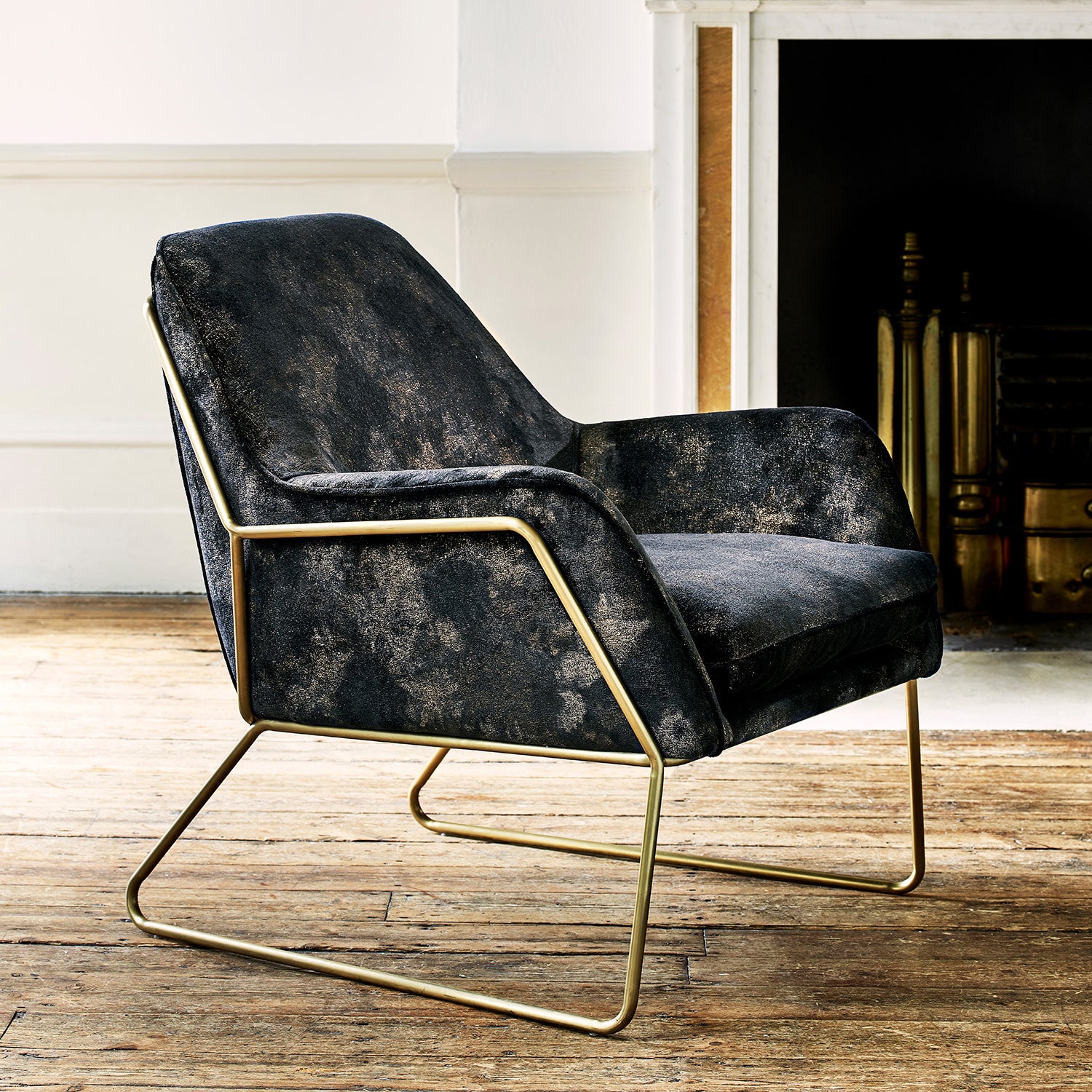 Chair upholstered in a luxurious dark blue velvet upholstery fabric with stunning metallic foil design