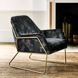 Chair upholstered in a luxurious dark blue velvet upholstery fabric with stunning metallic foil design