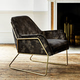 Chair upholstered in a luxurious black velvet upholstery fabric with stunning metallic foil design