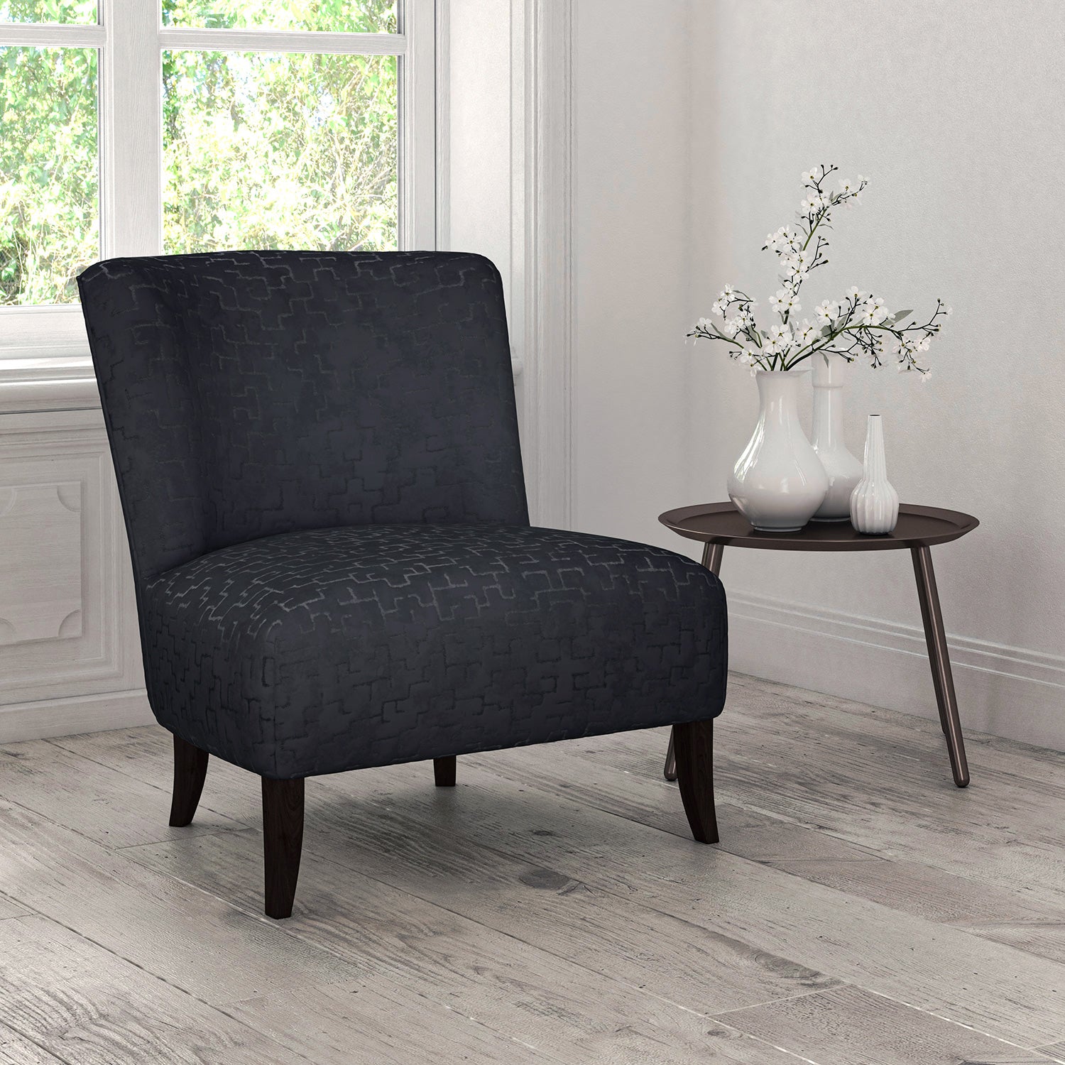 Chair upholstered in a stain resistant geometric velvet fabric