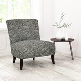 Chair upholstered in a dark neutral abstract weave upholstery fabric