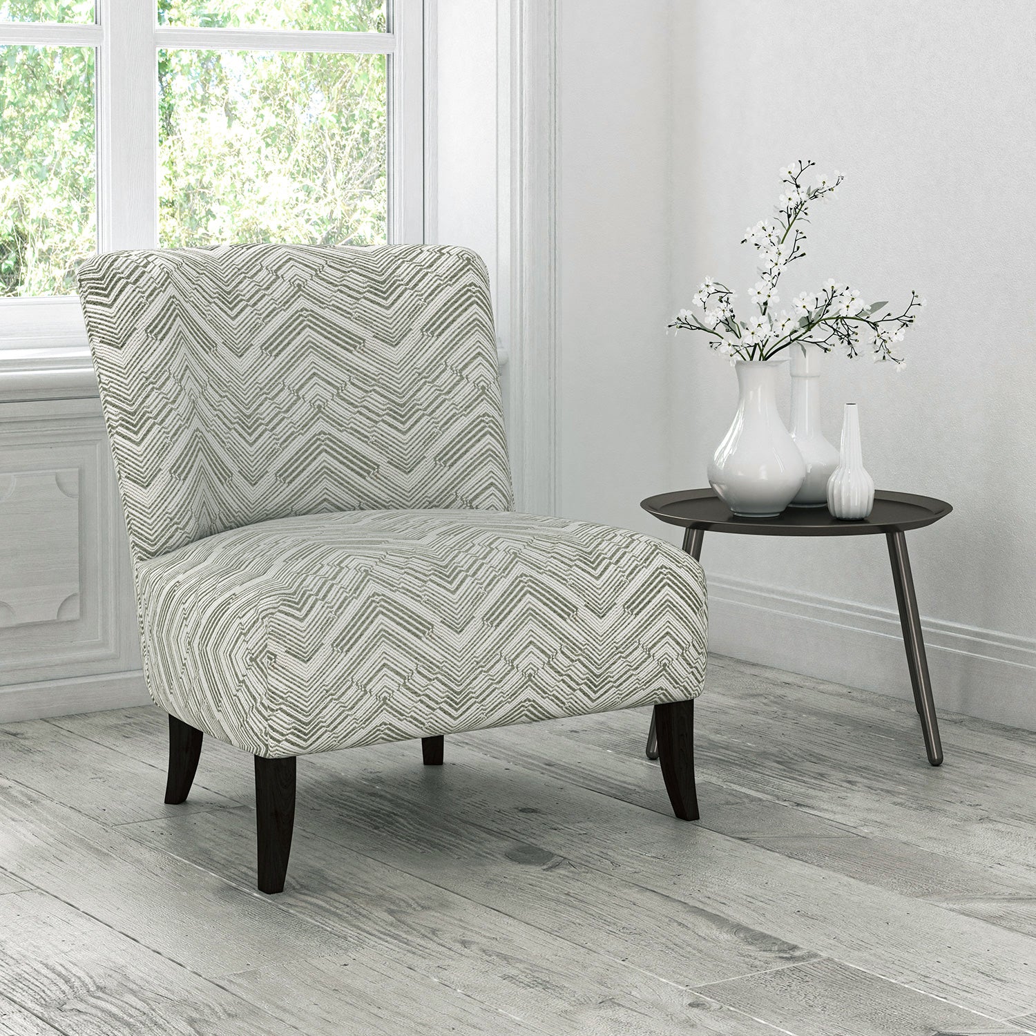 Chair upholstered in a stain resistant neutral herringbone weave upholstery fabric