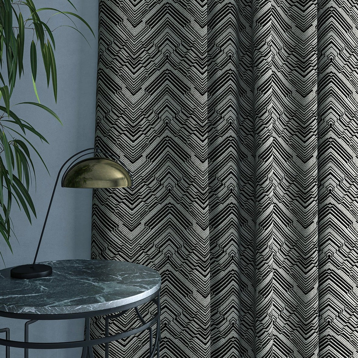 Curtain in a stain resistant black herringbone weave fabric