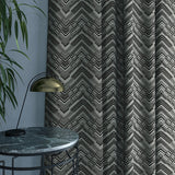 Curtain in a stain resistant black herringbone weave fabric
