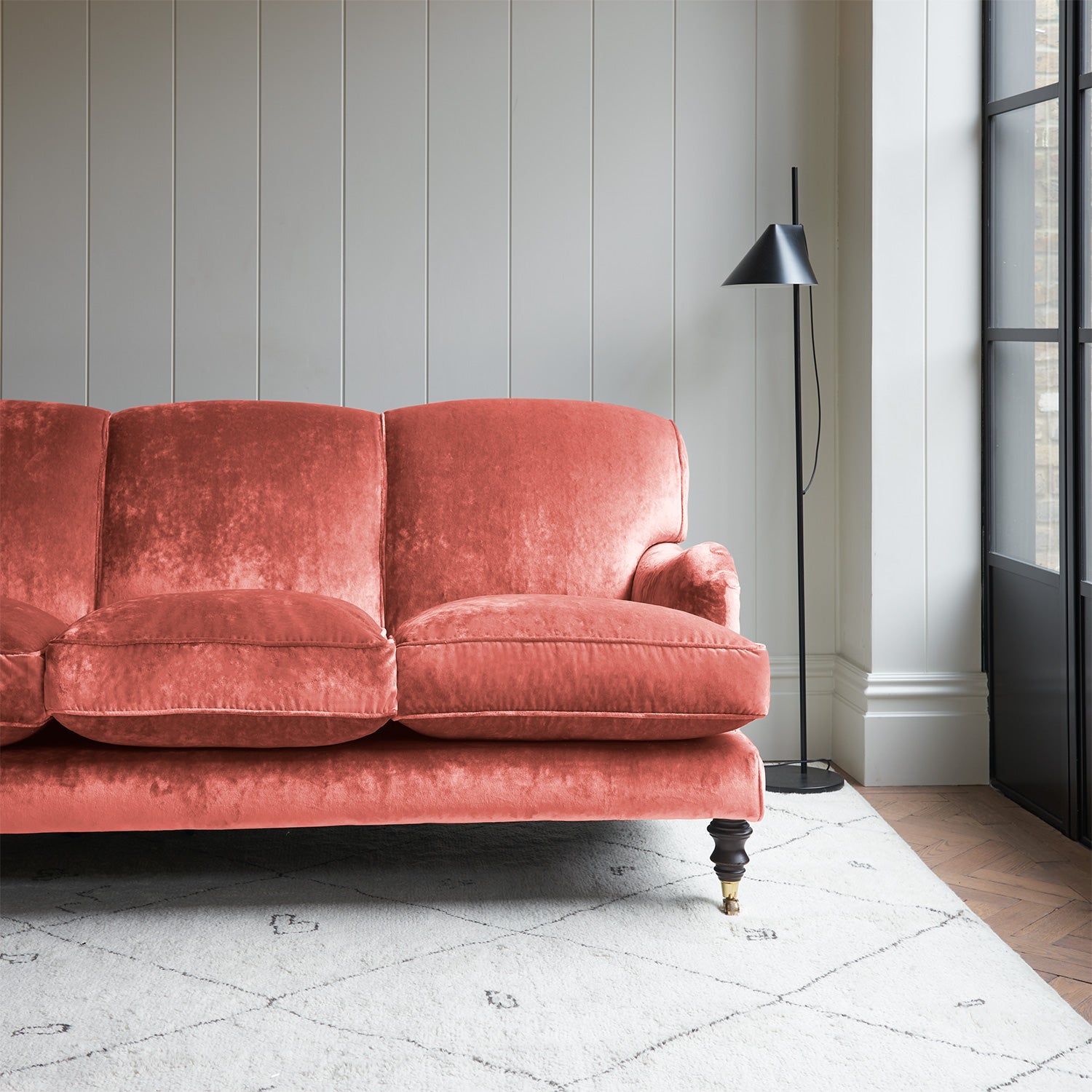 Velvet sofa in a pink crushed velvet upholstery fabric
