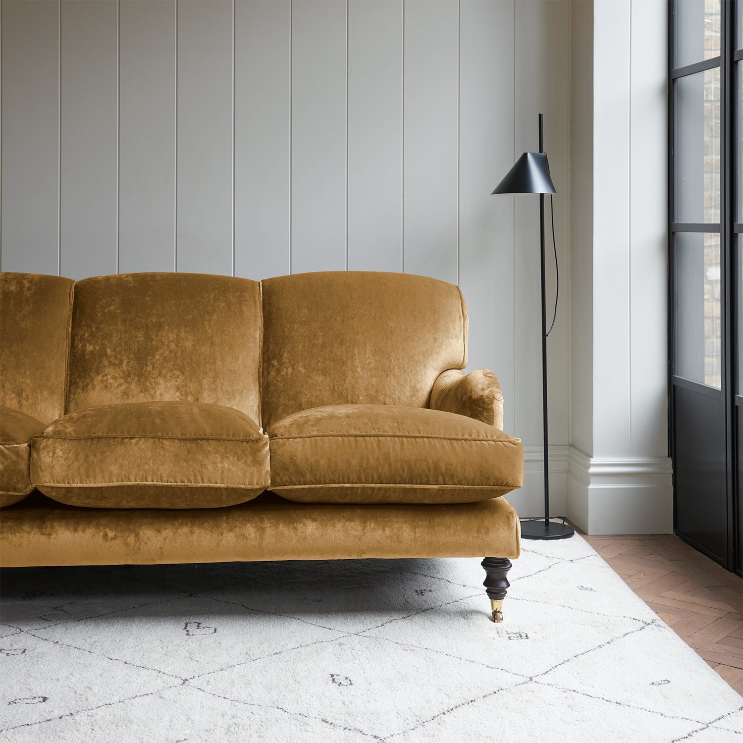 Velvet sofa in a yellow crushed velvet upholstery fabric