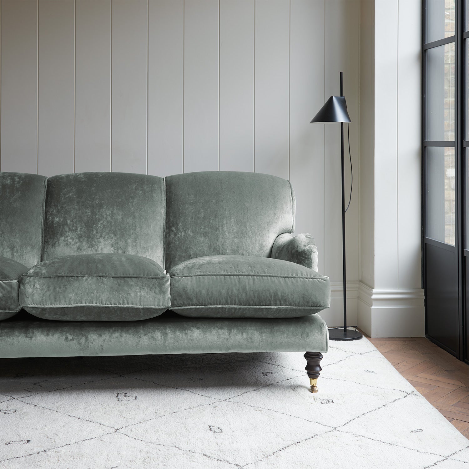 Velvet sofa in a light blue crushed velvet upholstery fabric