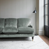 Velvet sofa in a light blue crushed velvet upholstery fabric