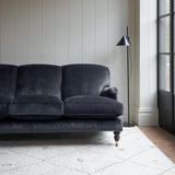 Velvet sofa in a dark blue crushed velvet upholstery fabric