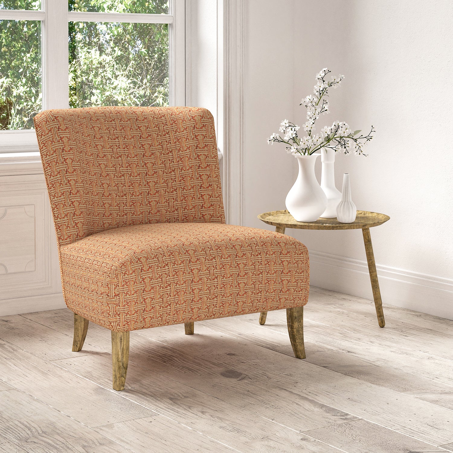 Chair upholstered in a stain resistant red fabric with geometric check design