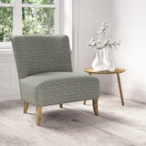 Chair upholstered in a stain resistant blue fabric with geometric check design