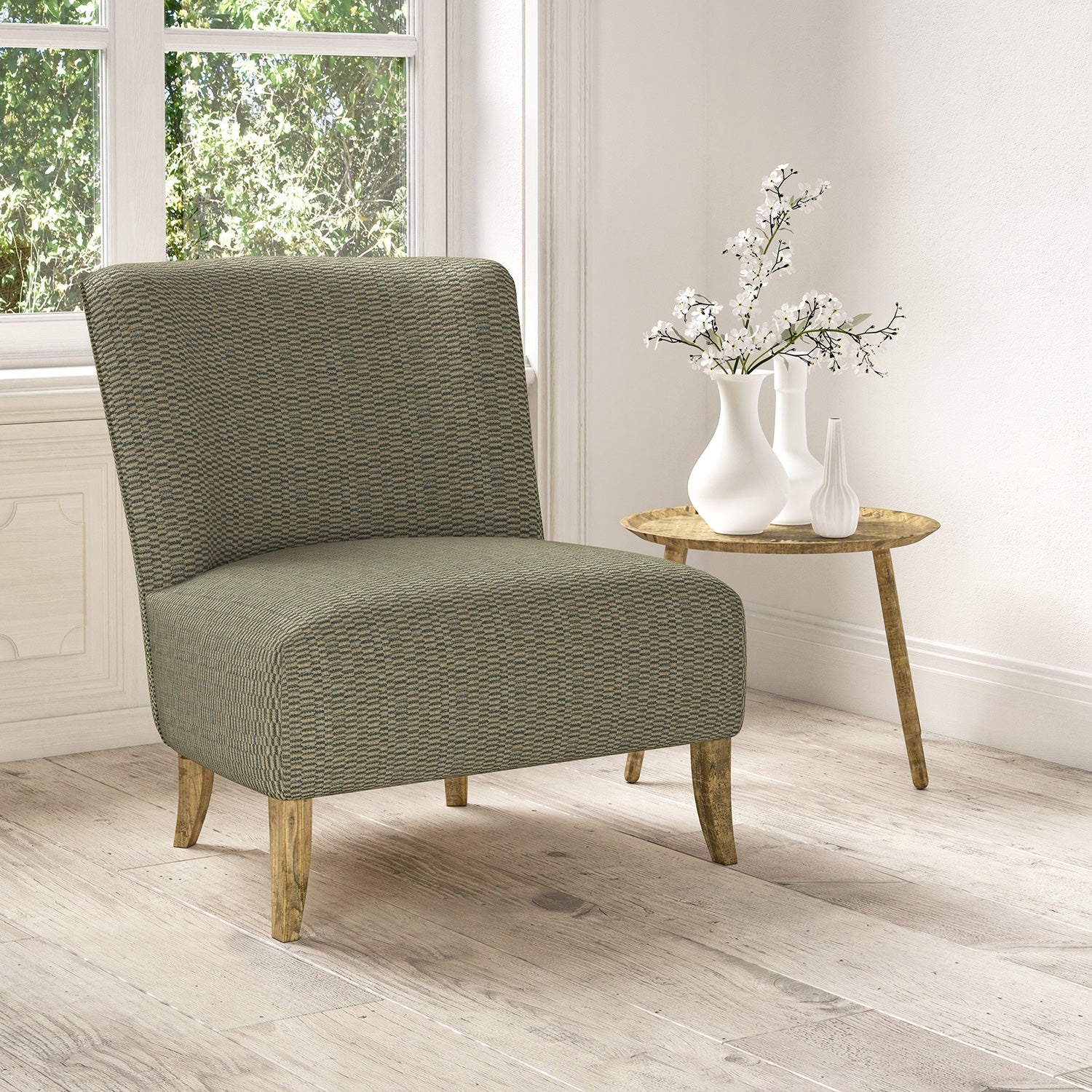 Chair upholstered in a stain resistant blue fabric with broken stripe design