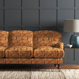 Velvet sofa upholstered in a brown velvet fabric with vintage kilim design and stain resistant finish