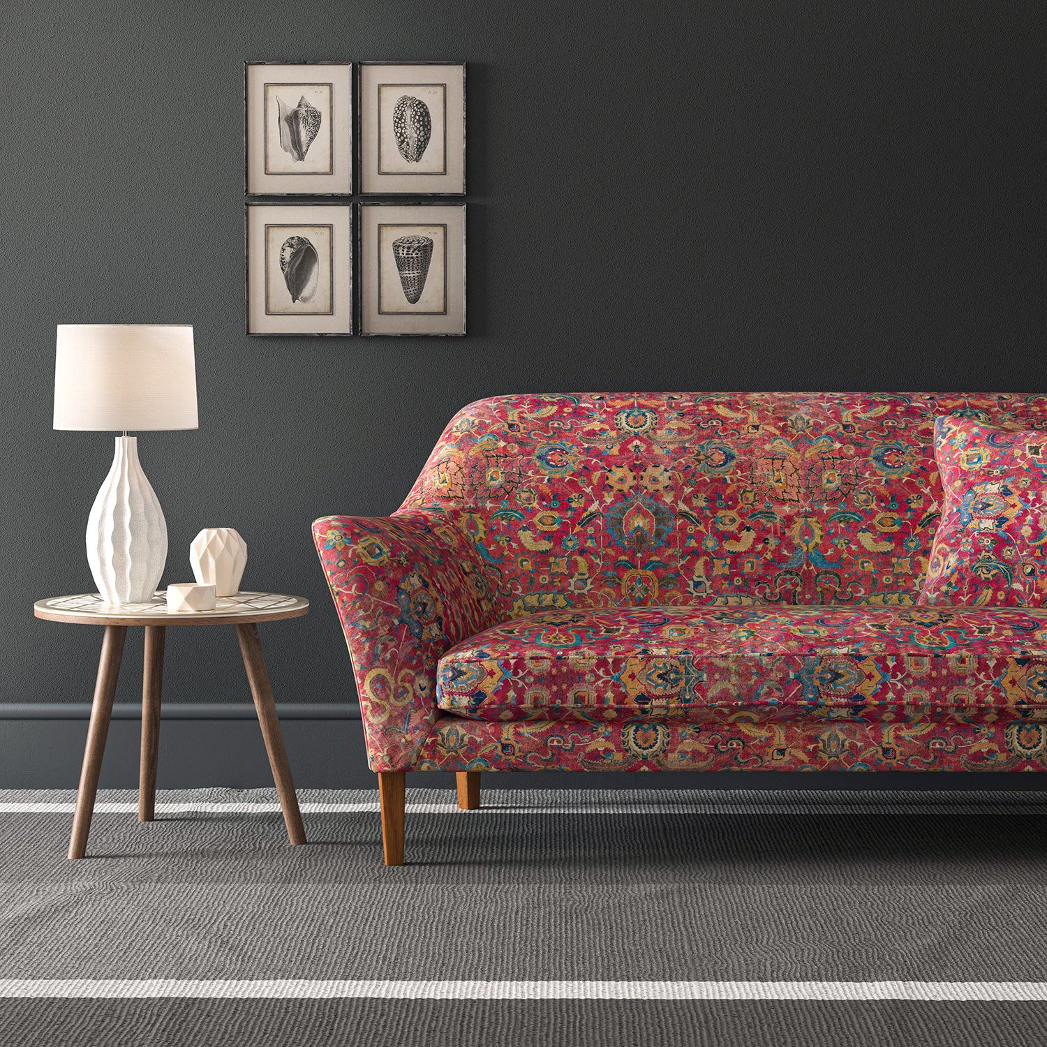 Velvet sofa upholstered in a pink and multicoloured velvet fabric with carpet design and stain resistant finish