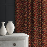 Velvet curtain in a stain resistant velvet fabric with a dark red kilim design